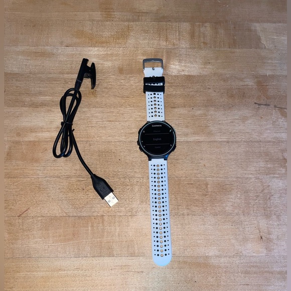 Garmin Fore Runner 235 with charger.